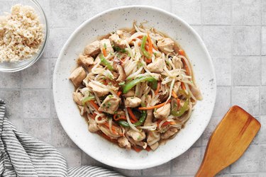 Plated chicken and bean sprouts stir-fry