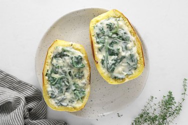 Add spinach filling to the squash