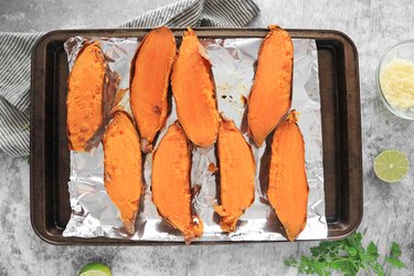 Slice sweet potatoes in half