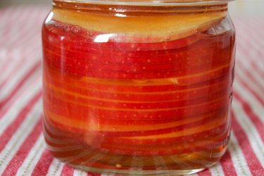 side view of pickled apples
