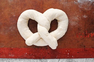 Fold down ends to create a pretzel shape