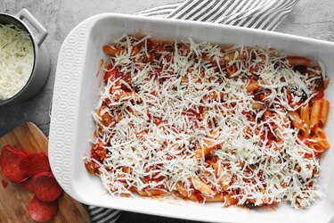 Add pasta and cheese to casserole dish
