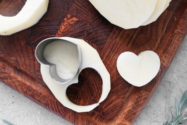 Cut potato hearts with a cookie cutter