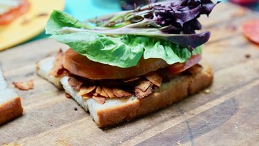 Making an amazing vegan BLT with coconut bacon.