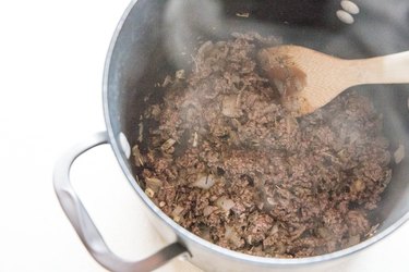 onion and ground beef in a pot