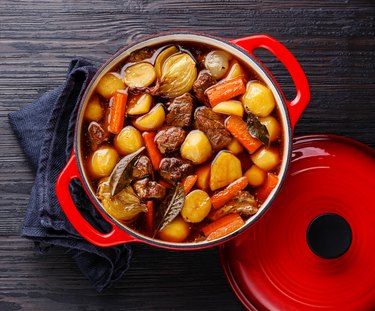 Beef meat stewed with potatoes in cast iron pot