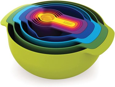 Colorful set of nested mixing bowls and measuring cups