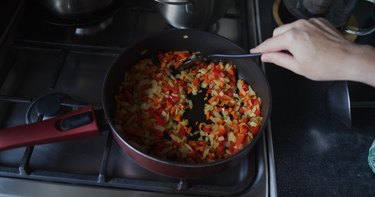 Preparing vegetables in a sauté pan