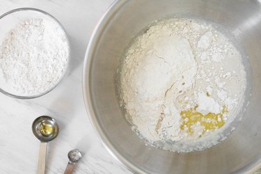 Add flour to yeast mixture