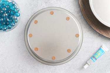 Cork pads on bottom of round cake pan