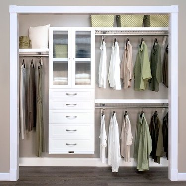 reach in closet system with cabinet