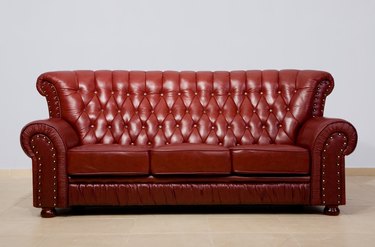 Leather sofa with nailhead trim