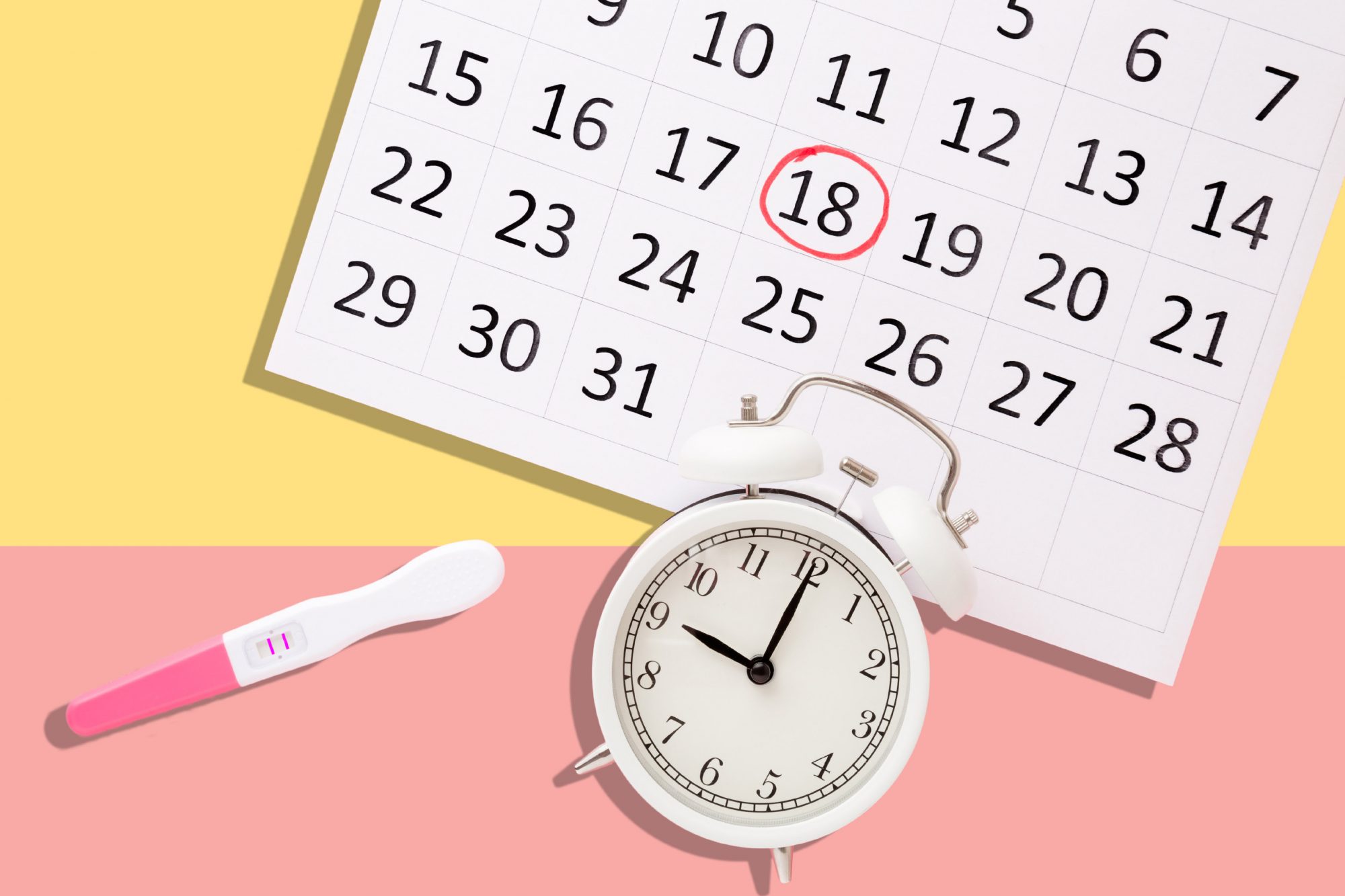 An image of a clock, pregnancy test, and a calendar on a colored background.