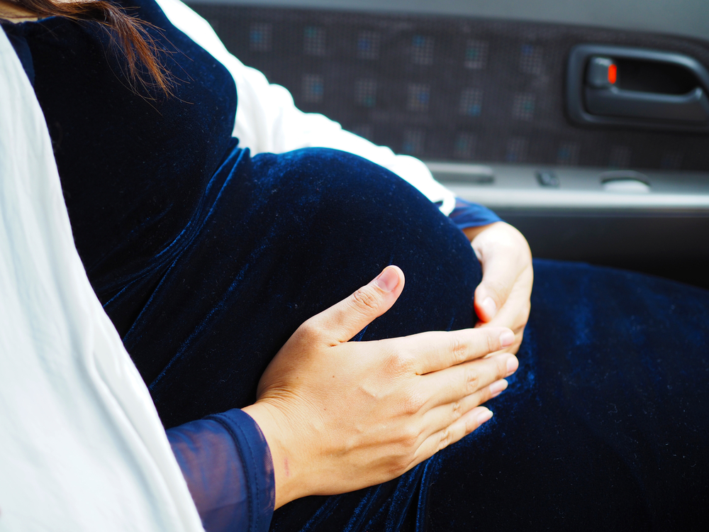 pregnant woman in the car