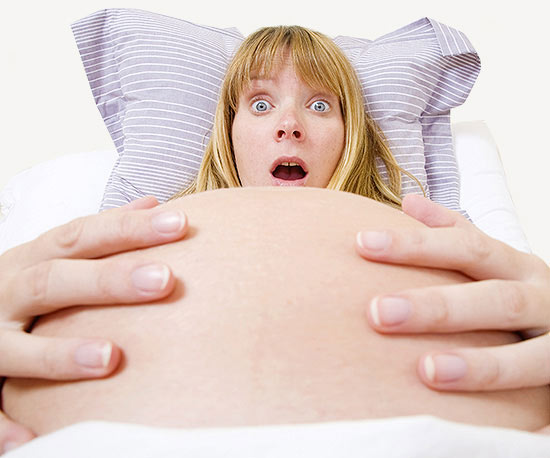 pregnant woman looking surprised